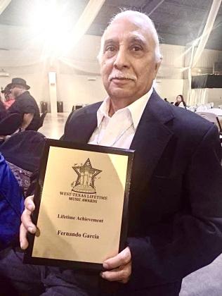 KLSR 105.3 radio personality Fernando “Cricket” Garcia is honored with the Lifetime Achievement Award at the Second Annual West Texas Lifetime Music Awards, organized by 22 Entertainment, Saturday, March 21 at the Prima Vista Event Center in Lubbock. Courtesy Photo