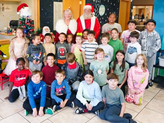 Santa and Mrs. Claus visit Wellington Opportunity Center