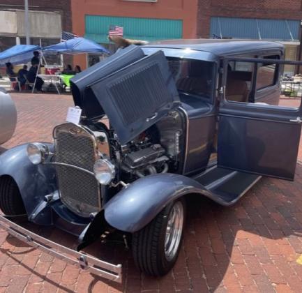 Jackie Yelton, of Amarillo, collects a prize for his ’31 Ford during the Wild &amp;amp; Free on 83 Car Show Saturday, Aug. 5.