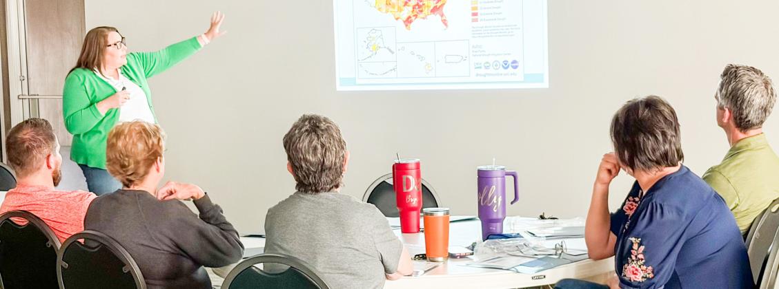 Jennifer Puryear, a meteorologist with RMBJ Geo, Inc., describes the 2026 drought monitor data to the attendees at the recent Rainwater Harvesting Workshop in Wellington. BEV ODOM/THE GREENBELT INTREPID