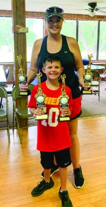 The team of Kristen Altman, Justin Hernandez, David Jurado and Frankie Jurado takes third place at the Red Marble Ministries 2022 Golf Tournament on Saturday, Aug. 20.