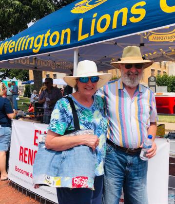 Rae-Lene Scarberry Wolf and her domestic partner, Jim Leach, partake in the fun on the Collingsworth County Courthouse Square during Wild &amp;amp; Free on 83 Saturday, Aug. 5. The Red River Sun