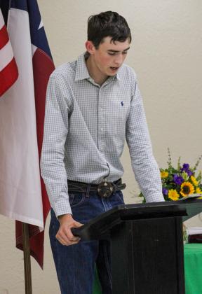 Childress County 4-Her Tripp Tippett gives the introduction at the 2025 Childress County 4-H Year End Banquet Monday, Aug. 25 at Fiar Park City Auditorium.