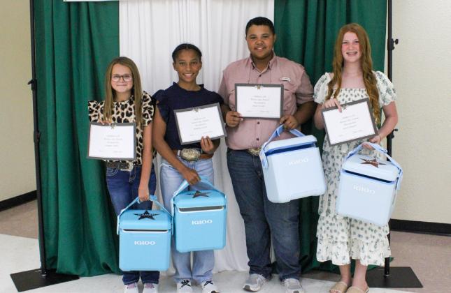 Cambri Willis, Brantly Session, Blaze Session and Liesel Schaefer receive the Bronze Star Award.