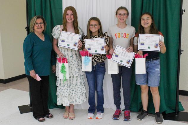 Quilt of Valor participants are recognized at the 2025 Childress County 4-H Year End Banquet Monday, Aug. 25 at Fair Park City Auditorium. The second year Childress County 4-H has participated in the National Quilts of Valor Foundation Program, this year’s quilt was given to local veteran James Gray, U.S. Army Sergeant First Class, during the Childress Elks Lodge’s Memorial Day Service. From left: Quilt of Valor Program Leader Ann Ricks, Leisel Schaefer, Cambri Willis, Miranda Henry, Bianca Escobedo.