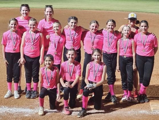 The first year for seven of the Lady Rockets to play softball, one mom described the girls as growing tremendously from game one to the last game and falling in love with the sport. Front row, from left: Juliet Solis, Raylie Sims, Peyton Roberson. Second row, from left: Blair Ward, Presley Kemp, Calleigh Henard, Quinn Roberson, Hadlee Patterson, Berkeley Ward, Cora Henard, Sara Morris. Back row, from left: Statistician Tana Roberson, Coach Molly Sims, Coach Lauren Patterson. Courtesy Photo