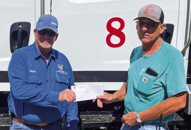 Lighthouse Electric, partnered with Golden Spread Electric, makes donation to Hedley VFD
