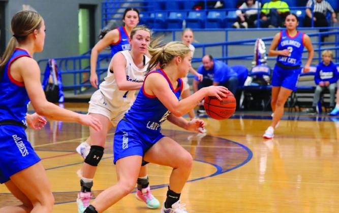 Childress’ Emma Jalomo, an All-Tournament Team selection, bypasses a Lampasas player during the 4th Annual Childress Rotary Holiday Invitational Thursday, Dec. 4-Saturday, Dec. 6 in the Bobcat Den. Childress High School Yearbook
