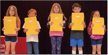 Carrie Skelton’s third graders accept A-B Honor Roll, Perfect Attendance and Most Improved awards as follows. From left: Ashlynn Duke, A-B Honor Roll, Most Improved; David Peters, A-B Honor Roll; Jaylann Thomas, A-B Honor Roll; Danny Blacksher, Most Improved; Juliet Cruz, Perfect Attendance.