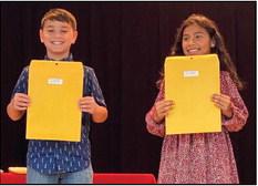 Carrie Skelton’s third graders accept American Citizenship awards as follows. From left: Collier Cantu, Kesley Hamner.