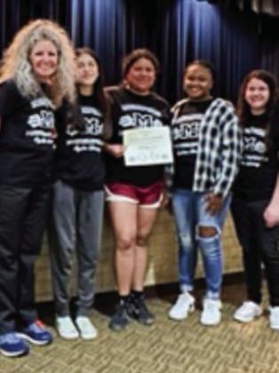 Memphis High School powerlifters, including Serena Aguilar, Emma Floyd, Mikayla Ledbetter and Emili Martinez, as well as David Espinoza and Darrell Thomas, who all qualified for regionals, are recognized. From left: Coach Michelle Branigan, Aguilar, Martinez, Ledbetter, Floyd. Not pictured is Espinoza and Thomas.