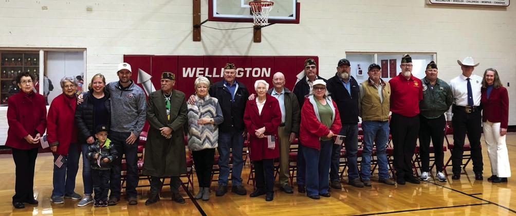 Wellington High School welcomes special guests to its annual Veterans Day tribute at 9:30 a.m. Friday, Nov. 11 in the gymnasium. From left, Barbara Roberson, Katherine Reeves, Abby, Bradley and Ethan Cole, Adam Sosa, Charlotte and Tony Stephens, Doris and Harry Stallings, Jeff and Alice Pastor, Heath Neeley, Lance Stephens, Lukas Wilbur, Mike Chandler, Jack and Shauna Gillentine. Not pictured: Denise Stephens, Lucy Owens. The Red River Sun/Bev Odom