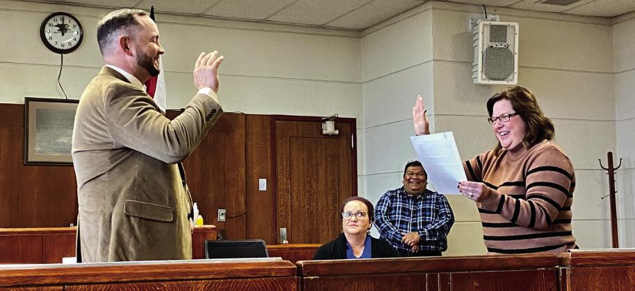 Childress County Judge Kim Jones swears in Childress County Sheriff Matthew Bradley, former Childress Police Sergeant, Monday, Nov. 14 in the Childress County Courthouse Courtroom. Bradley recently won the race for Childress County Sheriff, surpassing opponent Danny Gillem by 307 votes. The Red River Sun/Elizabeth Tanner