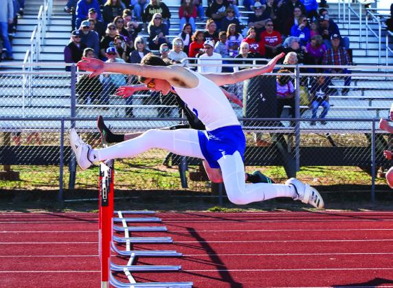Childress’ Conner Keys takes a first-place finish in the 100-meter hurdles during the Rocket Relays Thursday, Feb. 27 in Wellington. Childress High School Yearbook Staff