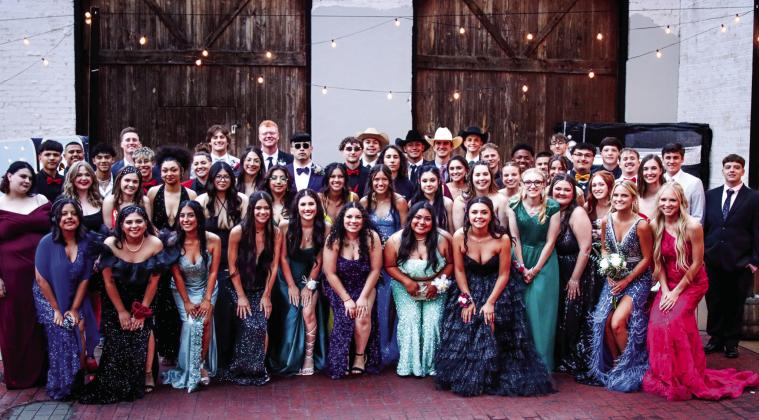 Despite a light drizzle, Childress High Schoolers attend prom Saturday, May 11, following a Prom Parade, which stretched from First Baptist Church, southbound down Commerce St. and northbound up Main St., to 1930 Remanent. The 2024 Prom Queen was Chloe Churchill, and the Prom King was Scout Smith. Photos by Childress High School Yearbook Staff