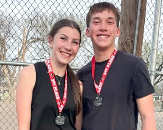 Opening the Wellington Tournament, mixed doubles second-place silver medalists are Anna Dwyer and Cix Killian.