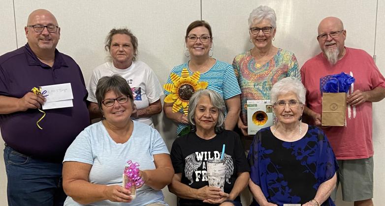 Bingo winners showcase prizes