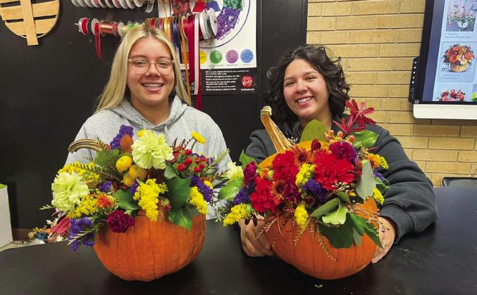 Floral design students repurpose pumpkins, tin cans