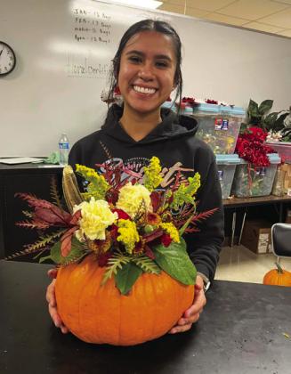 Floral design students repurpose pumpkins, tin cans