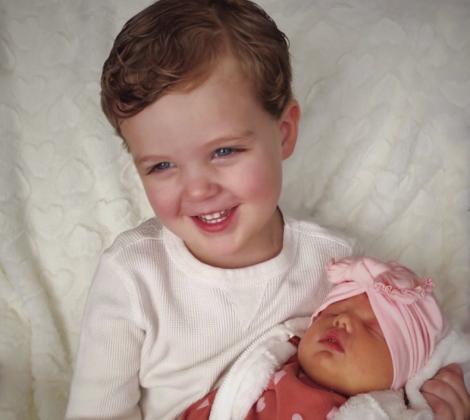 Calum Eric, 3, and Libby Leigh, 3 weeks, are the children of Eric and Kacee Needham, the grandchildren of Craig and DeeDee Needham and John and Marilyn Neeley, all of Wellington, and Ginger Burnett, of Clarendon, and greatgrandchildren of Dwight Bowen and Linda Neeley, both of Wellington, and Ricki Baker, of Loraine.