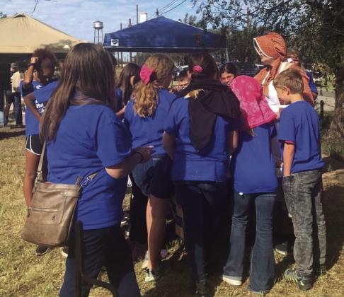 Curious students check out the Living History exhibits on School Day Friday, Oct. 6 at Powell Park.