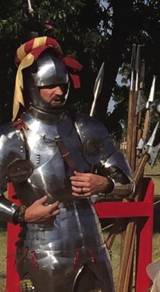 A 15th Century Knight, Sir Lonnie Colson, answers students’ questions, with Squire Isaac Colson close by his side.