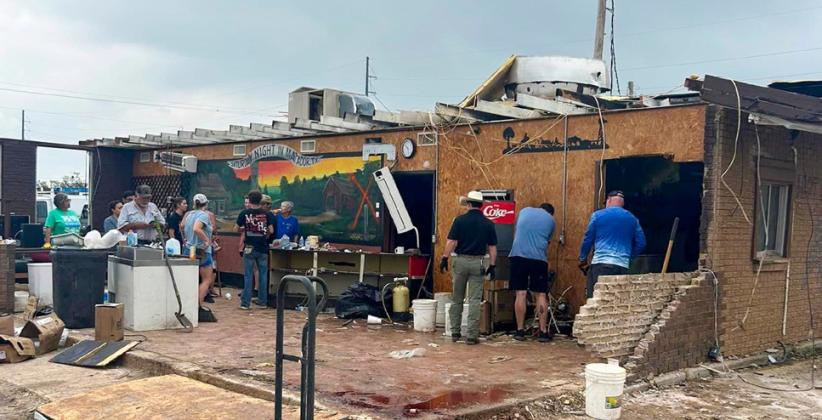 Volunteers make headway on the café cleanup in Matador, where an EF-3 tornado struck the evening of June 21, taking the lives of four people and injuring 15.