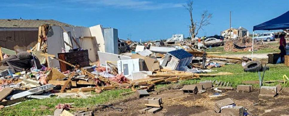 Cleanup continues in Perryton as various organizations aid residents, including Texas Baptist Men’s box ministry.