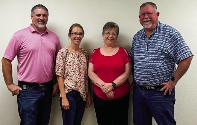 Collingsworth Farm Bureau Insurance staff congratulates Saunda James on her 18 years of dedicated service. From left, Brandon Ward, Sierra Hartman, James, Durk Green. The Red River Sun/Shauna Salinas