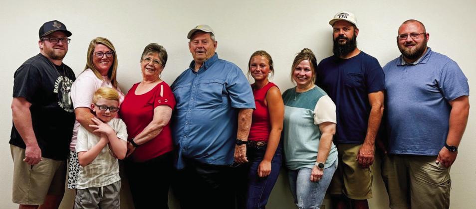 Saundra James and her family celebrate her retirement at the Thursday, July 25 reception. From left: son Craig, daughter-in-law Kim and grandson Noah James, of Amarillo; Saundra and husband John James; granddaughter Mikyela James, daughter Shanna Altman and son-in-law Nathan Altman, of Memphis; grandson Travis Leamon, of Childress.