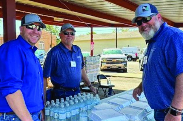 From 11:30 a.m.-1:30 p.m., Greenbelt Electric Cooperative staff, including Electrical Engineer Mark Lemons, Meter Technician Lance Stephens and Crew Forman Heath Neeley, serve to-go Danny’s Fens and Hens chicken basket lunches during Greenbelt Electric Cooperative’s 85th Annual Meeting.