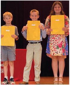 Karrie Hudson’s fourth graders accept A Honor Roll, Most Improved and Perfect Attendance awards as follows. From left: Paul Berry, A Honor Roll; Radley Keys, A Honor Roll, Perfect Attendance; Rachel Strickland, A Honor Roll, Most Improved. Courtesy Photos