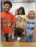 Third-graders Kiah Lewis, left, Angel Garza, Dallas Duke.