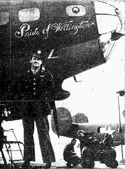 Captain Harris McCauley stands along the Flying Fortress, named for the town where he was reared. Floyd Killough Collection