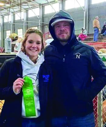 Emma Talley places sixth place with her duroc barrow at the recent Fort Worth Stock Show and Rodeo.