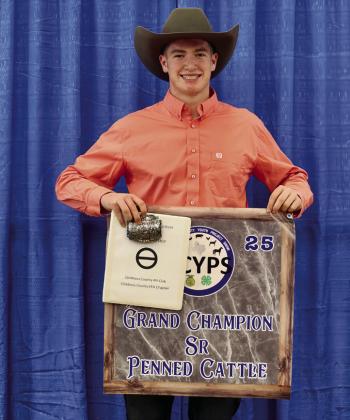 Cutter Bruce exhibits the Reserve Grand Champion Senior Penned Cattle, purchased by Childress Regional Medical Center.