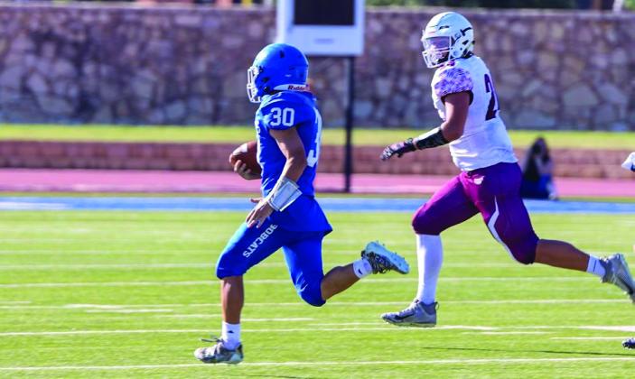 The junior varsity Childress Bobcats win big Thursday night, Sept. 22, tumbling the Bowie Jackrabbits 53-30 at Fair Park Stadium. For additional photos, see 12B. Photos by Childress High School Yearbook Staff