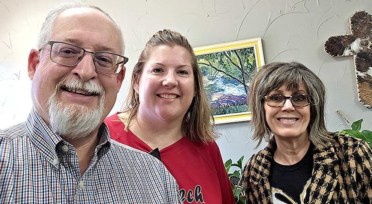 The Clarendon Enterprise owners Roger and Ashlee Estlack with The Red River Sun Associate Editor Bev Odom.