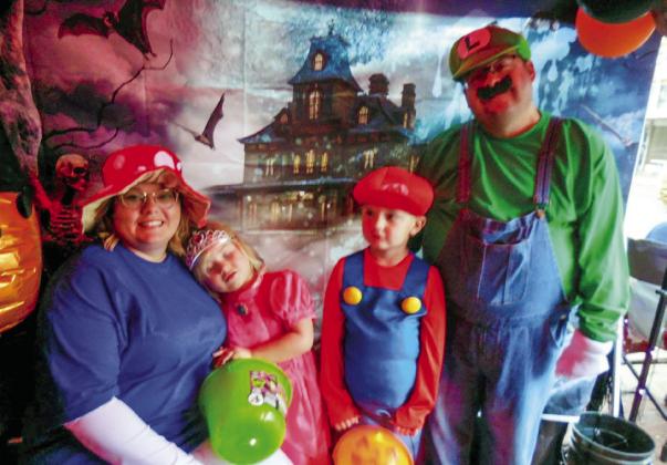 Matt Nix, dressed as Luigi, wins the adult male category in the Memphis Chamber of Commerce Halloween Costume Contest Saturday, Oct. 28, earning $50. “It was so very hard for our board to pick,” Memphis Chamber of Commerce Manager Kim Cloyd said. “We thank you all for the fun and for entering our contest.” Photos by Memphis Chamber of Commerce