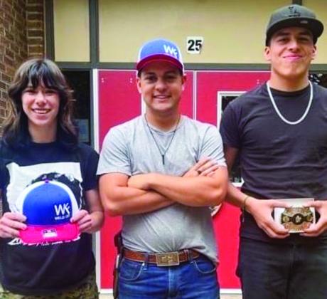 Addy Mock, left, Eric Garcia and Juan Vazquez display special awards they won at the Wichita Falls welding event.