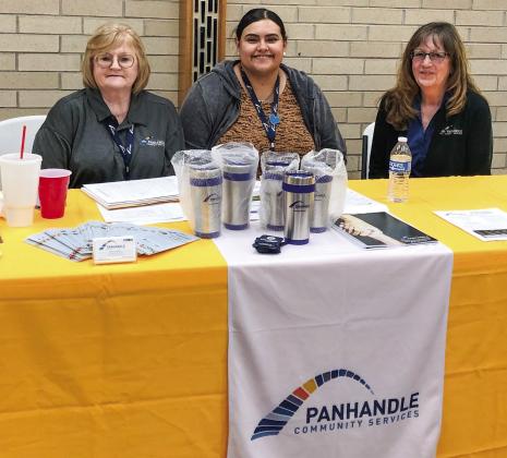 Panhandle Community Services (PCS) staff, including Utility Specialist Marcia Campbell, Communications Specialist Bianca Ramos and Pampa PCS Center’s Vicki Ray, set up an application workshop in Wellington Tuesday, April 18. The Red River Sun/Bev Odom