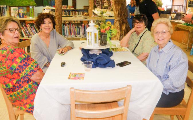 Childress Public Library celebrates the 50th year anniversary of moving into their current home, located at 117 Ave. B NE, with a recent Open House. Among guests were, from left, Brenda Roach, Marsha Murphy, Soundra Christy and Althea Driver.