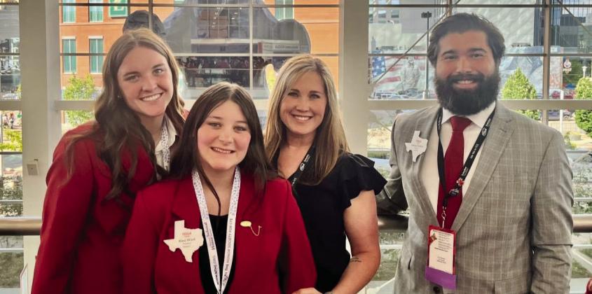 Childress High School Family, Career and Community Leaders of America (FCCLA) members Corbin Daniel and Kimi Ward, Texas FCCLA Region 1 President, and Advisers Amy Detwiler and Jeffrey Collins attend the 2023 FCCLA National Leadership Conference Opening General Session.