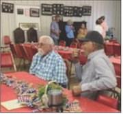 Danny Lewis, of Hollis, Okla. and Kenneth Derrick, of Dodson, reminisce about Dodson days gone by.