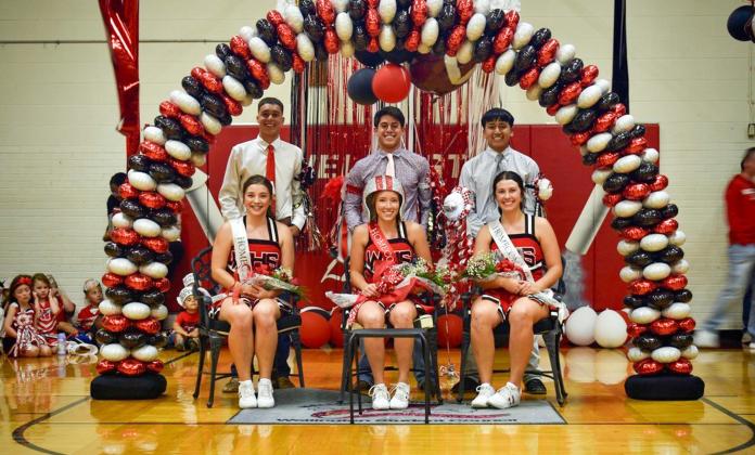 Skyrocket Football Queen Bryn Phillips and Skyrocket King Noah Cantu, center, are coronated last Friday afternoon during the homecoming pep rally. First runners-up Treylea Wiebe and Major Brown, left, and second runners-up Brynlee Proffitt and Joey Orozco, right, accept homecoming royalty accolades. Wellington High School