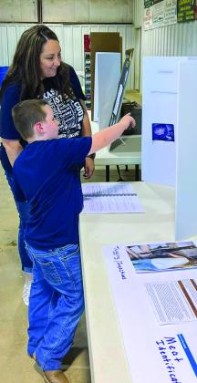Hall County 4-H hosts an enrollment party, including project booths, cornhole, line dancing and refreshments, Sunday, Aug. 21 at the Hall County Show Barn. “Thank you to everyone who braved the rain and come to sign up,” Hall County 4-H posted on Facebook, also thanking the team officers for creating project information posters. “It was great to visit and learn about 4-H projects.” Photos Courtesy of Hall County 4-H