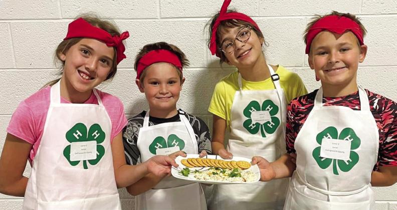 At the District 1 4-H Food Challenge, the Collingsworth County team of Samarra Cantu, left, Keylen Jeffrey, Emma Zaragoza and Claydan Peckler takes fourth place in the Junior Appetizer category. The Food Challenge is described as the kids’ version of the popular television show “Chopped.” Courtesy Photos