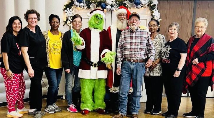 Collingsworth County Home Delivered Meals staff and Board of Directors gather with The Grinch and Santa during the Saturday, Dec. 9 breakfast fundraiser. From left: Becky Reyes, Dana Hughs, Sandra Coffee, Linda Duke, Grinch, Santa, Billy Wilkerson, Celia Brown, Saundra James, Helen Gollihugh.