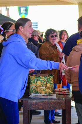 The Red River Sun, with help from the Childress County Heritage Museum, hands out over 4,000 tickets during the Treasure Hunt Friday, Nov. 29.