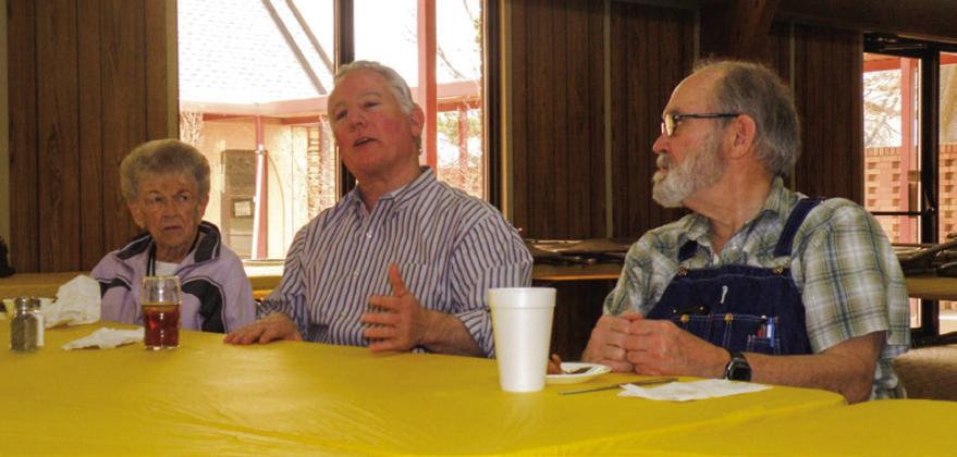 Greg Buckley, center, relates his experience on “American Pickers,” aired on the History Channel, at the Adult Fellowship Luncheon at the Childress Methodist Church. The episode, “Law and Horader,” which featured Buckley’s collection of antiques aired in August 2015. He was described on the show “laying down the law during the day and collecting antiques at night,” a nod to his job as Childress County Attorney. From left: Anne Fromm, Buckley, Harvey Dobbs. Photo by Grace Holman